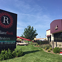 Exterior photo of the Relianz Bank sign and building.